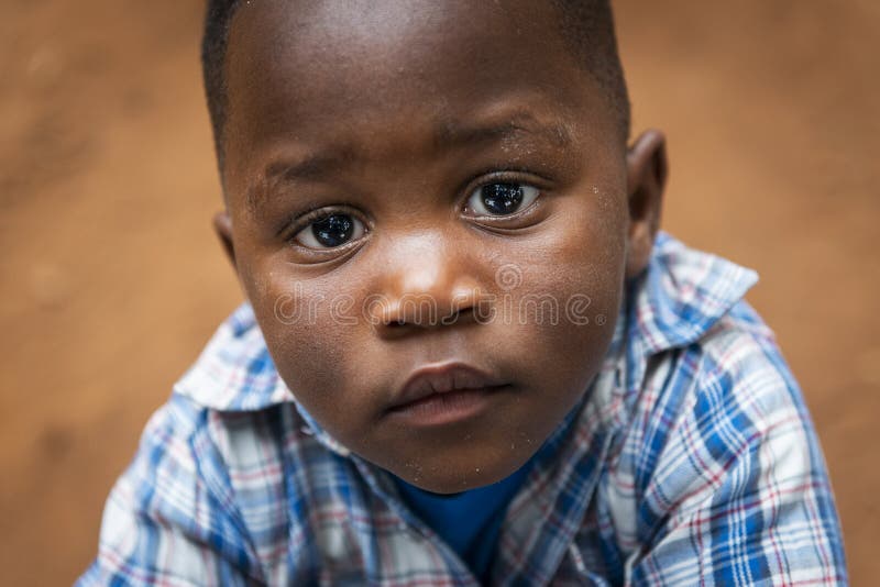 Portrait of a young boy at the Missira neighborhood in the city of Bissau stock images Portrait of a young boy at the Missira neighborhood in the city of Bissau stock images