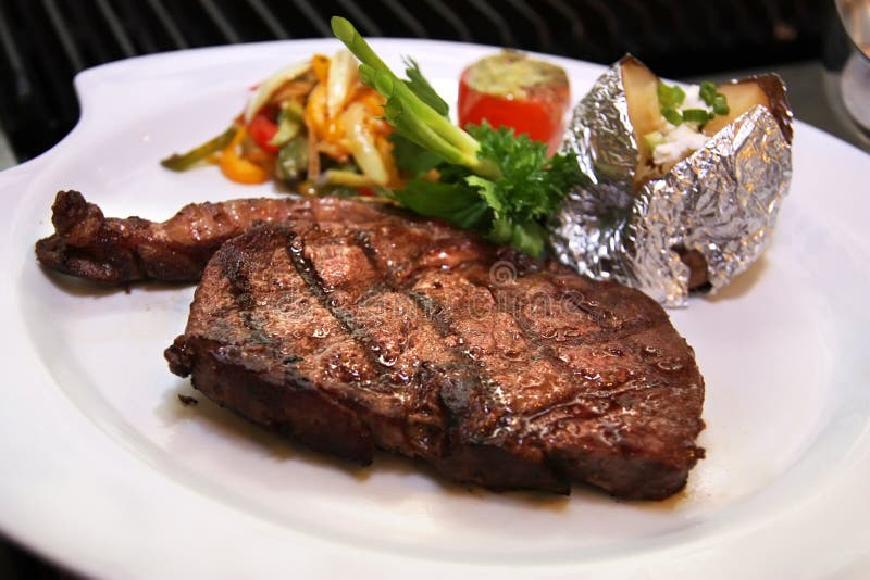 Bistecca di lombata immagini stock Bistecca di lombata immagini stock