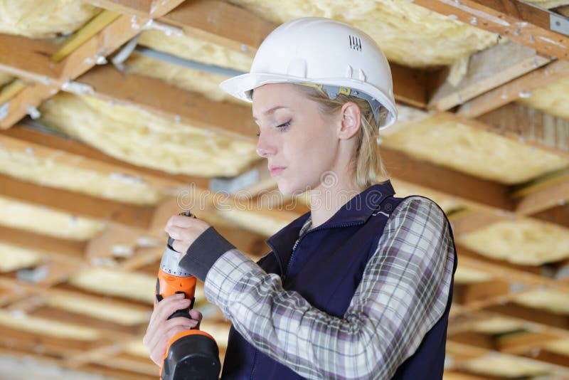 Bit de taladro de cambio del constructor femenino fotografía de archivo