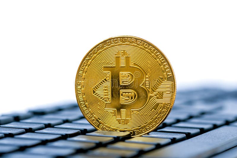 Bitcoin auriu în spațiul pentru copii de la tastatură stock photography