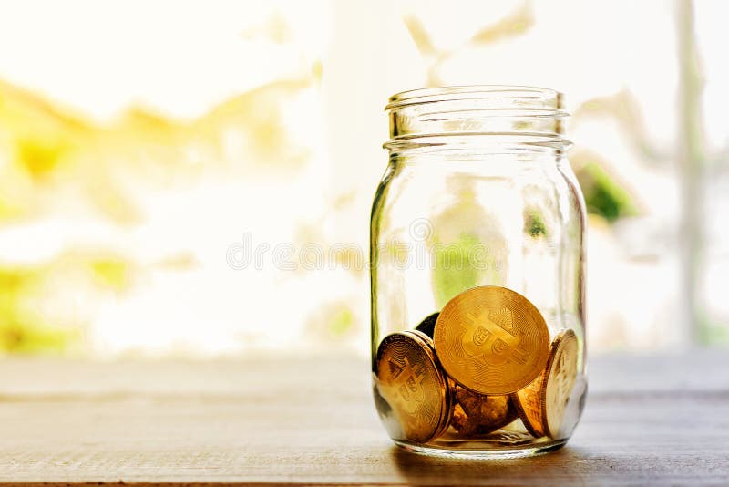 Bitcoin coin golden coin in the glass jar ,stack of cryptocurrencies bitcoin isolated on white background,Bitcoin coin golden coin royalty free stock image Bitcoin coin golden coin in the glass jar ,stack of cryptocurrencies bitcoin isolated on white background,Bitcoin coin golden coin royalty free stock image