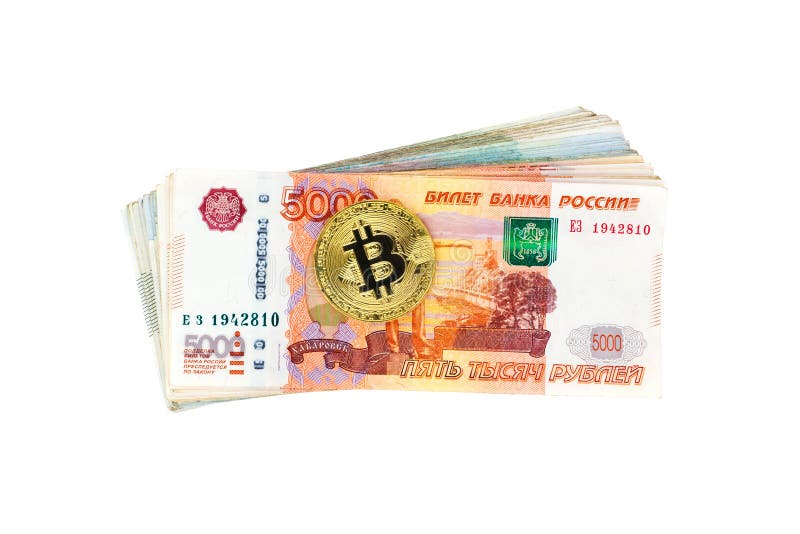 Bitcoin coin and stack of russian banknotes royalty free stock photo Bitcoin coin and stack of russian banknotes royalty free stock photo