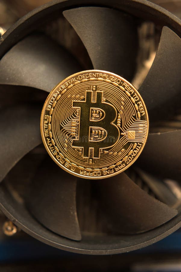 Bitcoin on the Fan of a Computer Graphics Card Mining Concept Stock