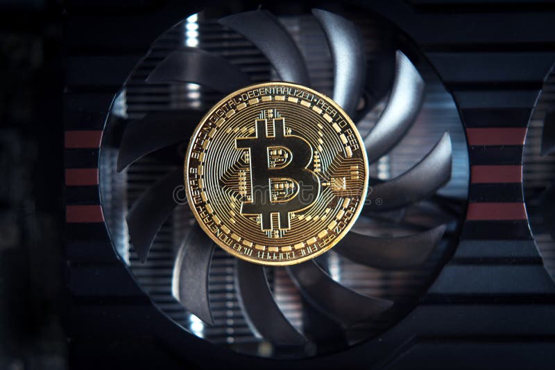 Bitcoin on the Fan of a Computer Graphics Card Mining Concept Stock