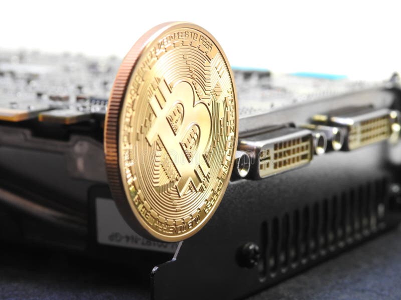 Bitcoin hanging on graphics processing unit or GPU royalty free stock photography Bitcoin hanging on graphics processing unit or GPU royalty free stock photography