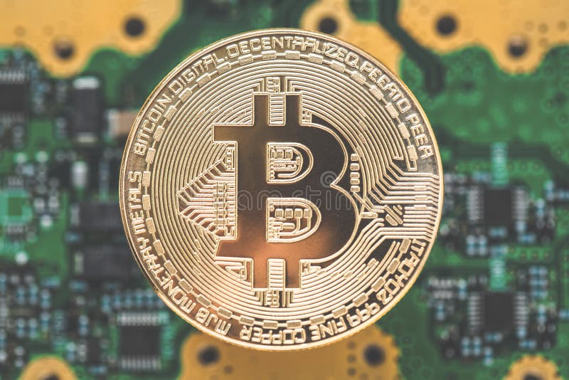 Bitcoin on the microchip background with tone effect. stock image