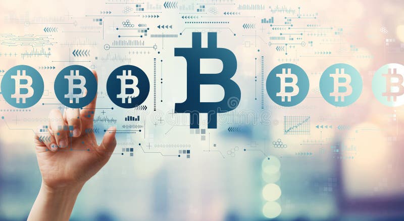 Bitcoin theme with hand pressing a button royalty free stock photo