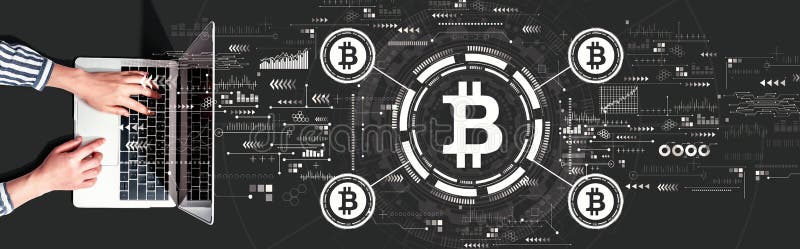 Bitcoin theme with person using a laptop stock photos