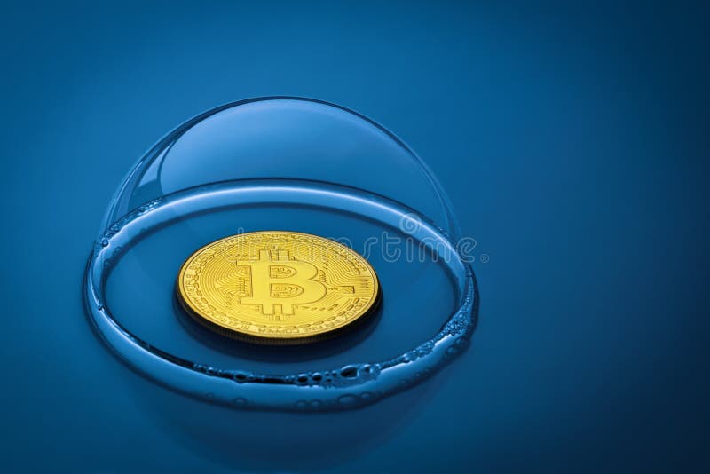 Bitcoin in una bolla di sapone su un fondo blu fotografie stock Bitcoin in una bolla di sapone su un fondo blu fotografie stock