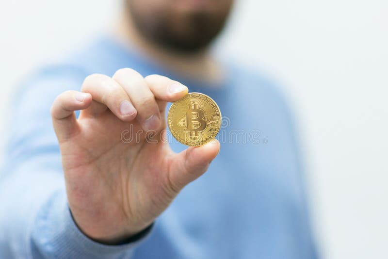 Man Holding Bitcoin in the Hand Stock Photo - Image of finance, concept ...