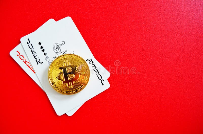 Bitcoin z jokerów karta do gry zdjęcie stock