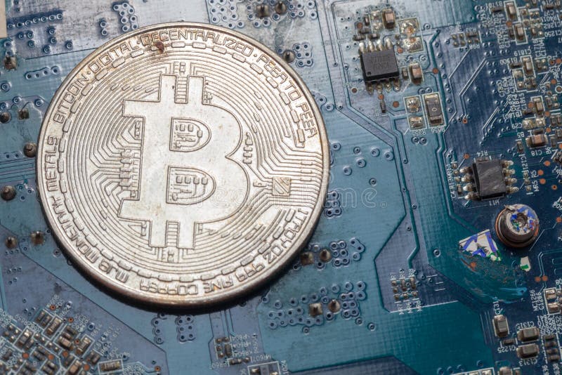 Bitcoin на плате с печатным монтажом стоковое фото rf Bitcoin на плате с печатным монтажом стоковое фото rf