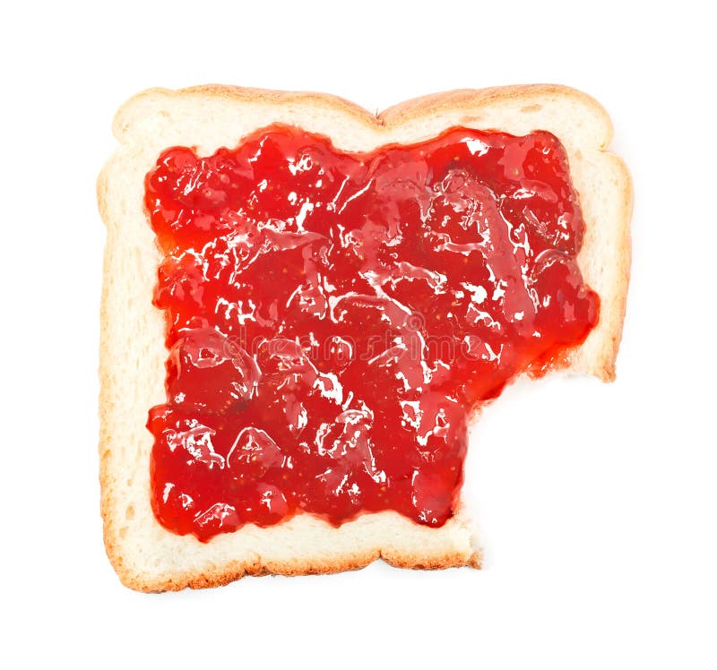 Bite out of a slice of bread with strawberry jam royalty free stock image