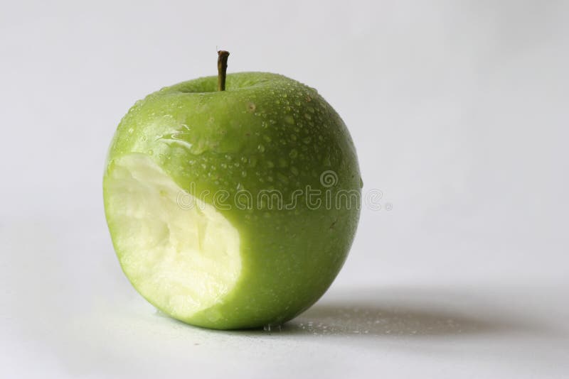An apple with a bite. Crispy diet stock images, royalty-free photos and pictures