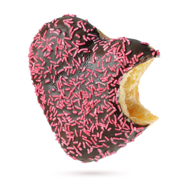 Bitten heart shape chocolate donut with red sprinkles isolated on white background