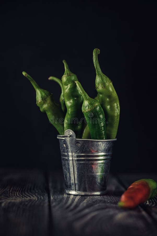 Bitter Green Pepper in Cold Tones. Green Pepper in a Small Bucket, Peppers in a Bucket on the
