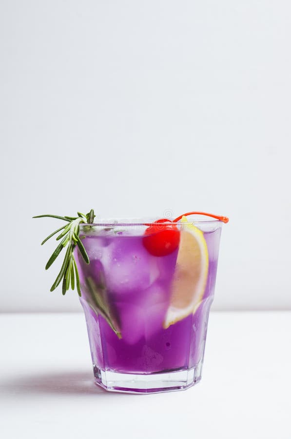 Bitter Oldfashioned Cocktail with Lemon Slice and Cherry Stock Photo