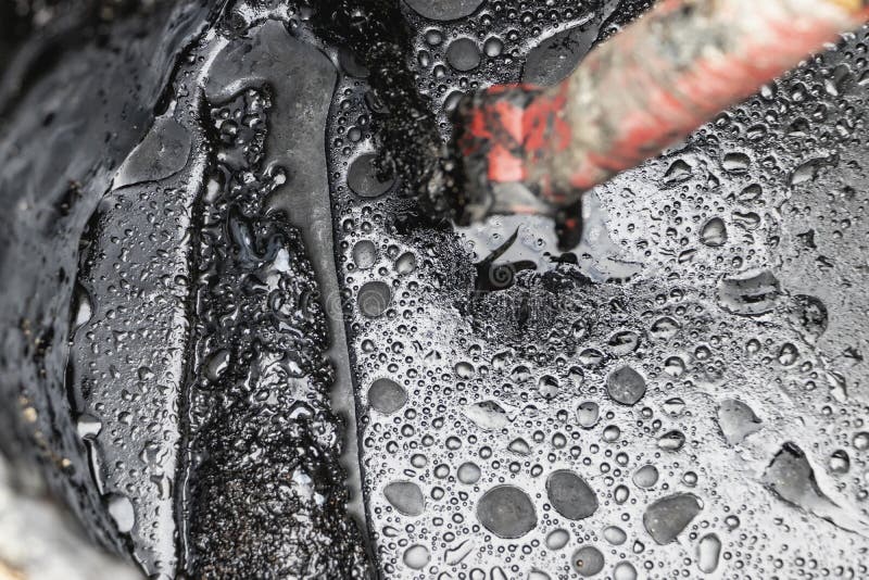 Bituminous Mastic for Waterproofing in a Bucket. Application of