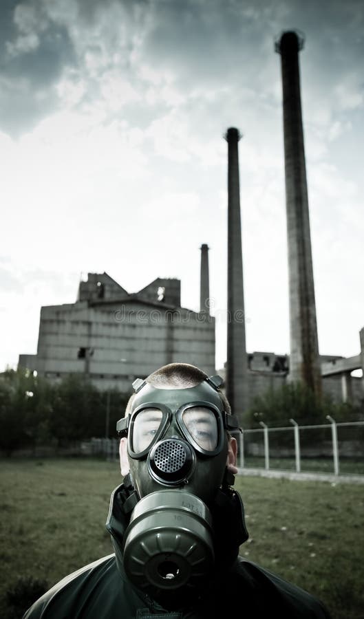 Bizarre portrait of man in gas mask