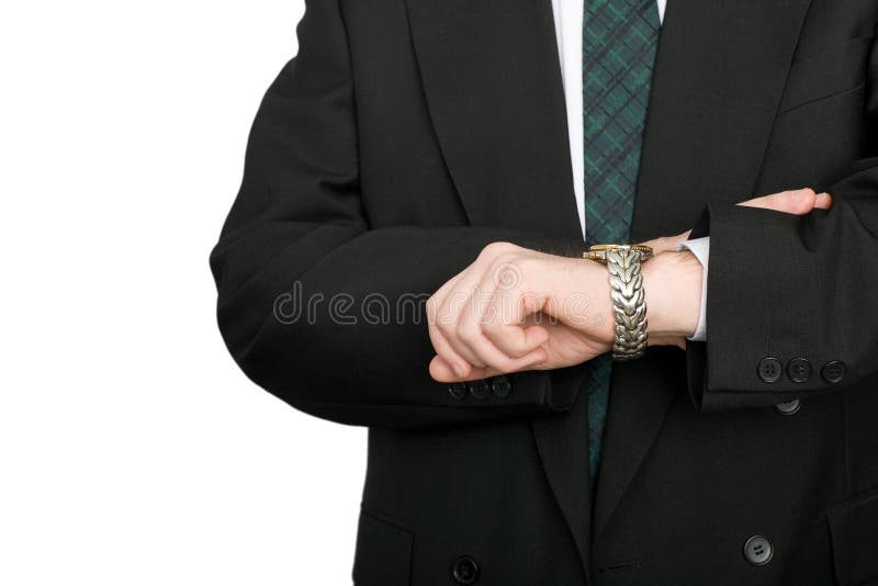 biznesmen jego spojrzeń czas wristwatch fotografia stock biznesmen jego spojrzeń czas wristwatch fotografia stock