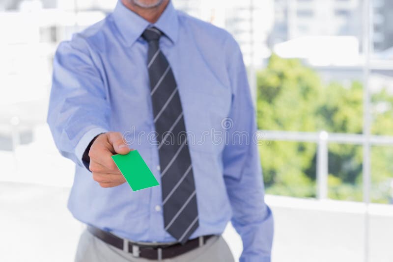 Biznesmen ofiary zieleni wizytówka obrazy stock Biznesmen ofiary zieleni wizytówka obrazy stock