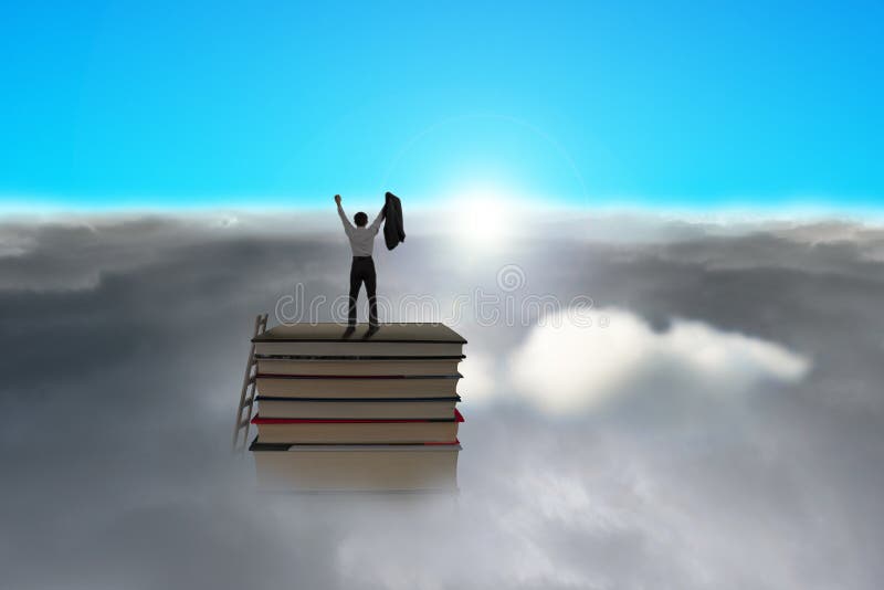 Businessman standing on top of stack of books with cloudy below and blue sky, sunlight. Businessman standing on top of stack of books with cloudy below and blue sky, sunlight