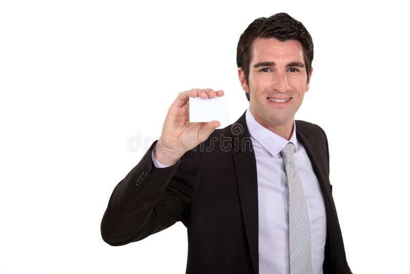 Biznesmen trzyma up hiscard obraz royalty free Biznesmen trzyma up hiscard obraz royalty free