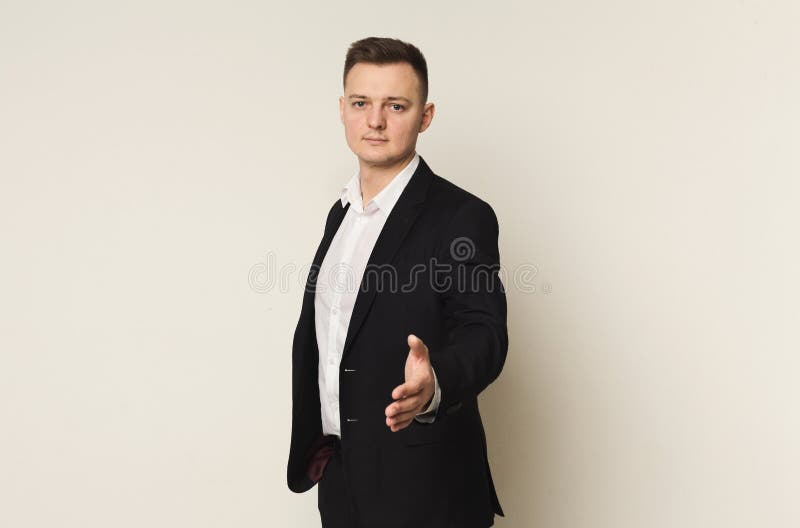 Biznesmen z otwartą ręką przedłużyć uścisk dłoni obraz stock Biznesmen z otwartą ręką przedłużyć uścisk dłoni obraz stock