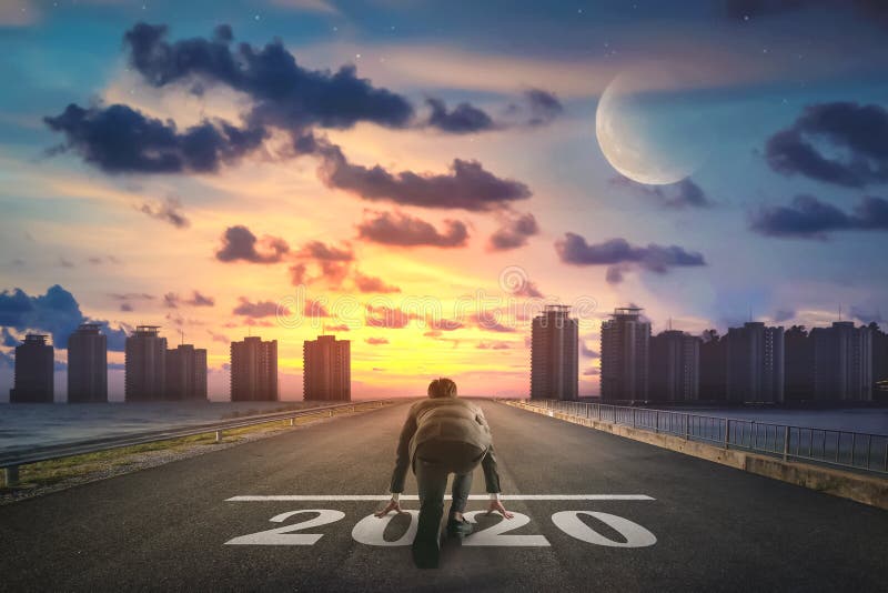 Businessman starting road to success 2020. Elements of this image furnished by NASA. Businessman starting road to success 2020. Elements of this image furnished by NASA.