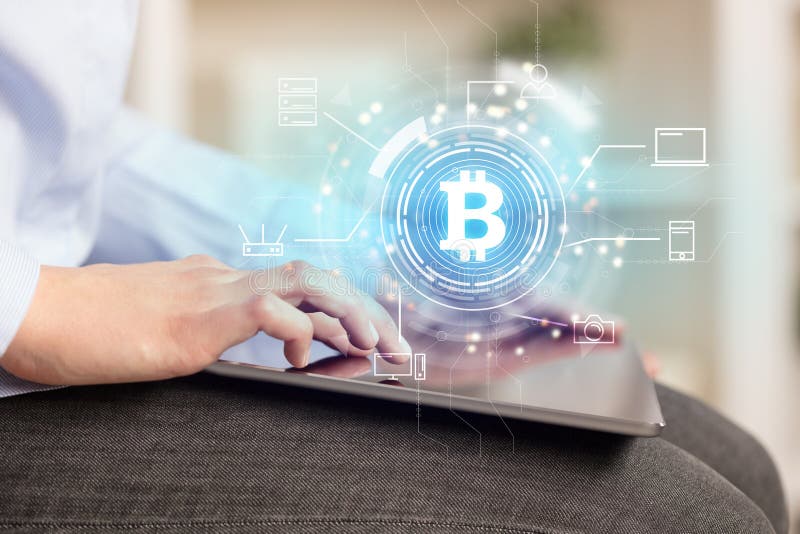 Business woman using tablet in home office mood with bitcoin link network concept.