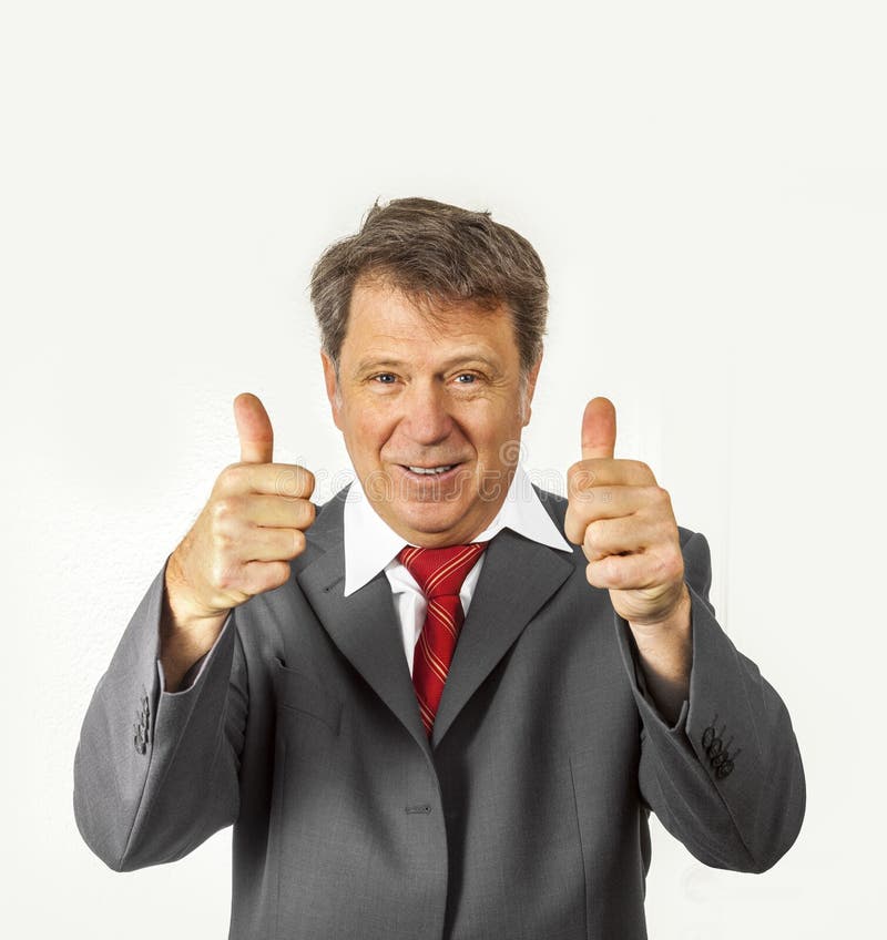 Biznesowy mężczyzna daje aprobata znakowi fotografia stock Biznesowy mężczyzna daje aprobata znakowi fotografia stock