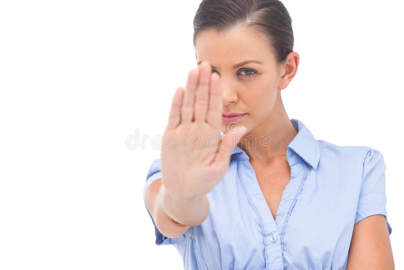Bizneswoman mówi przerwę z ręką fotografia royalty free