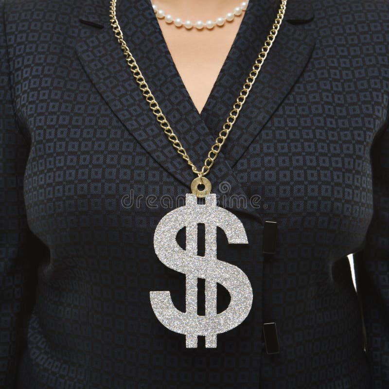 Close-up of Filipino middle-aged businesswoman wearing chain necklace with oversized dollar sign. Close-up of Filipino middle-aged businesswoman wearing chain necklace with oversized dollar sign.