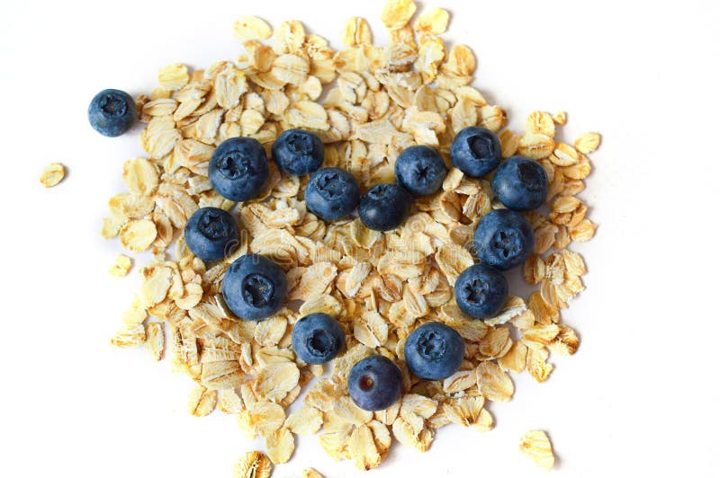 Bl?b?r och oatmeal Begreppet av sund n?ring, bantar royaltyfri fotografi Bl?b?r och oatmeal Begreppet av sund n?ring, bantar royaltyfri fotografi