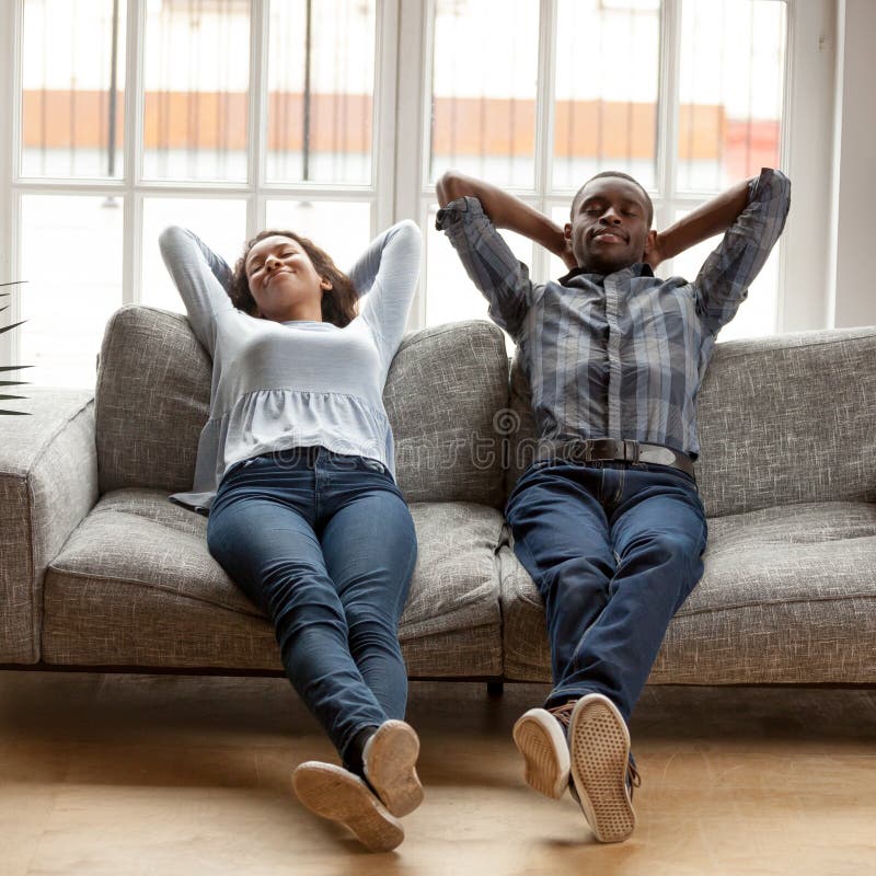 Black Wife And Husband Putting Hands Behind Heads Lying Resting St