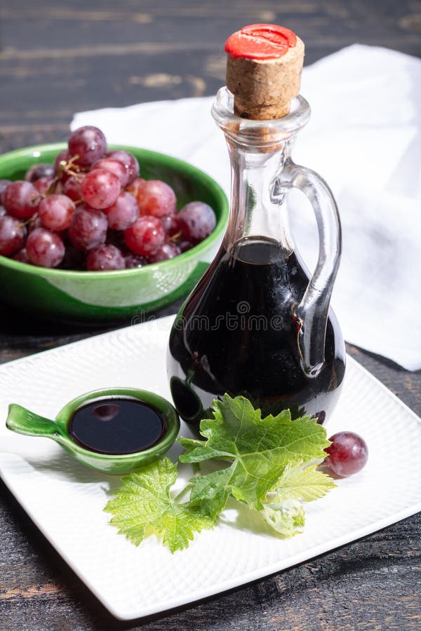 Black Aged Natural Balsamic Vinegar Dressing from Modena, Italy Stock