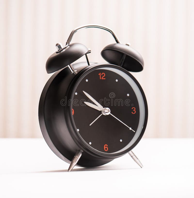 Black alarm clock royalty free stock photography