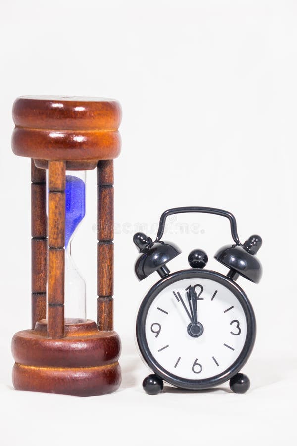 Black Alarm Clock And Hourglass Stock Photo Image of metal, alarm
