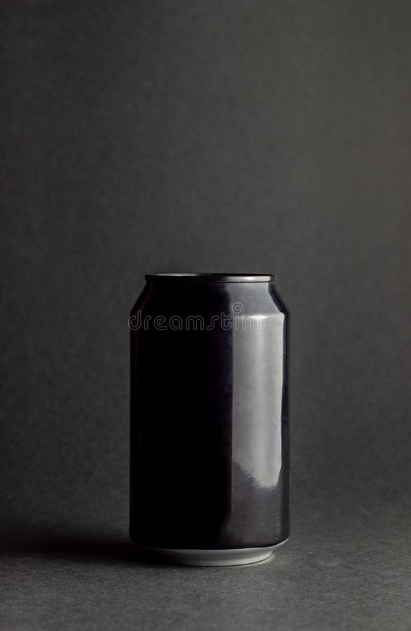 Black aluminum can on a black background. Mock-up