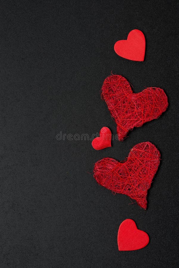 Lots of Little Red Hearts on Black Background. Romantic Love Background