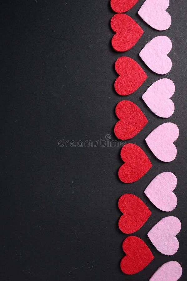 Black background with red and pink hearts, space for text, copyspace. Concept background for Valentine's Day. Day copyspace stock images, royalty-free photos and pictures