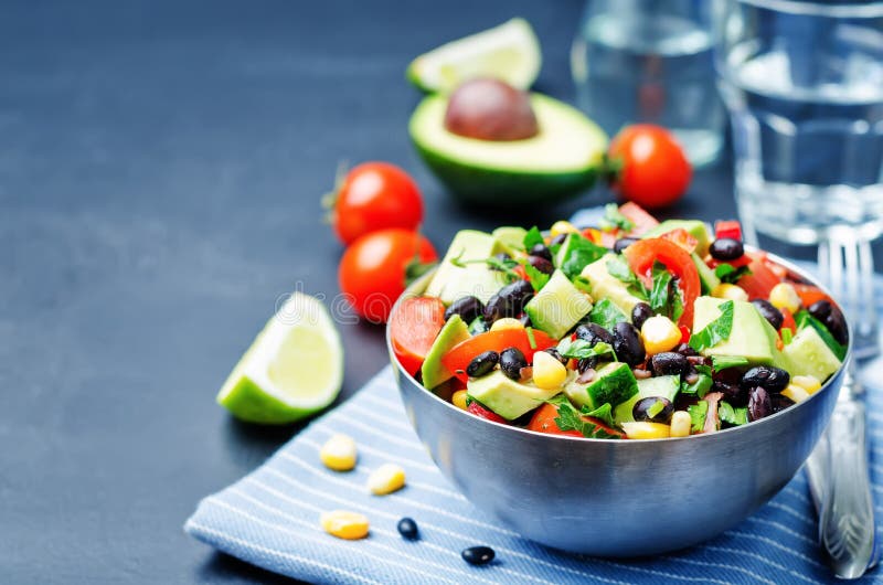 Black Beans Corn Avocado Cucumber Tomato Salad with Lime Dressing Stock ...