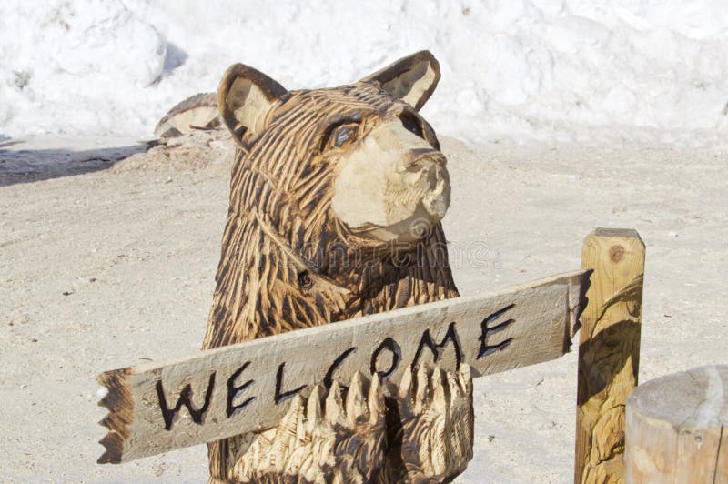 Black Bear with Sign Wood Carving Statue Stock Photo Image of