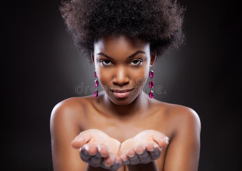 Attractive black beauty reaching out hands