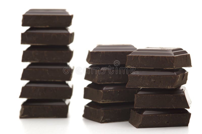 Bitter Chocolate Pieces with Sea Salt on Dark Wooden Surface. Stock Photo Image of candy