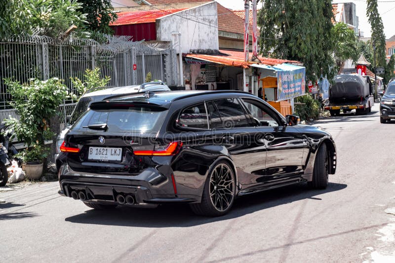 Surakarta Indonesia February 9 2024 BMW M3 G81 is the sixth generation of BMW M3. It available in four doors sedan and station wagon bodystyle. The engine is S58 six cylinders twin turbo that able to produced 510 horsepower and paired with all wheel drive. Surakarta Indonesia February 9 2024 BMW M3 G81 is the sixth generation of BMW M3. It available in four doors sedan and station wagon bodystyle. The engine is S58 six cylinders twin turbo that able to produced 510 horsepower and paired with all wheel drive