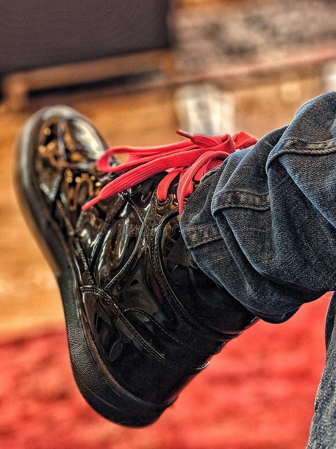 Black boots with red laces stock image. Image of waiting - 162736077