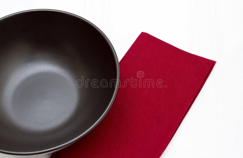 Black bowl and red napkin stock image. Image of napkin 21929079
