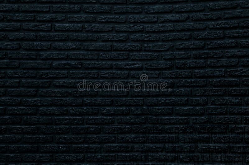 Vista frontale di colore nero muro di mattoni.