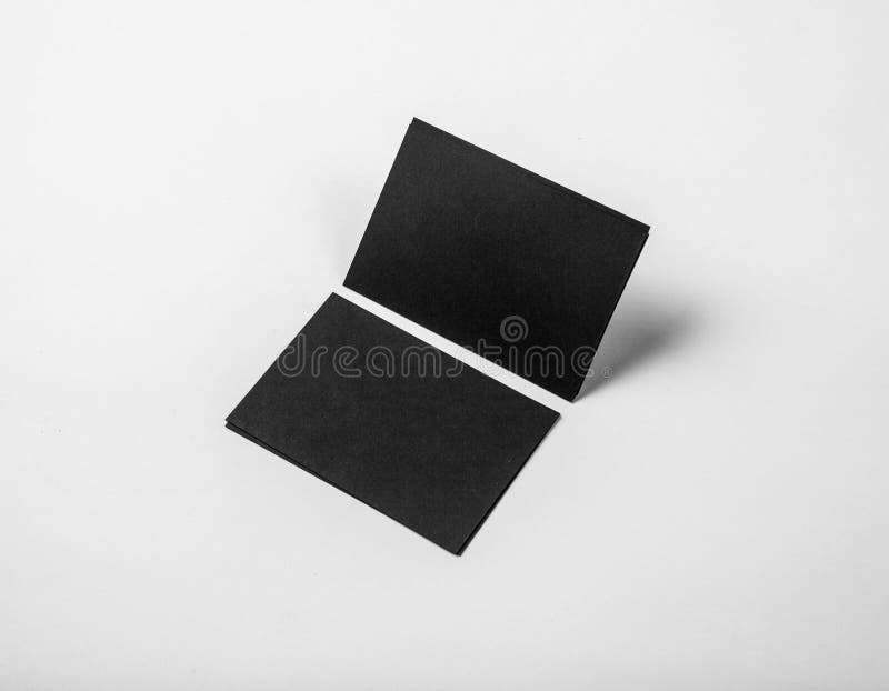 Black business cards on a white background. Identity design, corporate templates, company style. Horizontal stock image Black business cards on a white background. Identity design, corporate templates, company style. Horizontal stock image